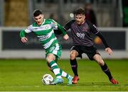 16 February 2024; Trevor Clarke of Shamrock Rovers is tackled by Archie Davies of Dundalk during the SSE Airtricity Men's Premier Division match between Shamrock Rovers and Dundalk at Tallaght Stadium in Dublin. Photo by Stephen McCarthy/Sportsfile