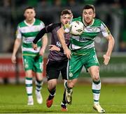 16 February 2024; Aaron Greene of Shamrock Rovers in action against Scott High of Dundalk during the SSE Airtricity Men's Premier Division match between Shamrock Rovers and Dundalk at Tallaght Stadium in Dublin. Photo by Stephen McCarthy/Sportsfile