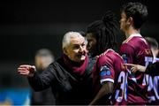 16 February 2024; Galway United manager John Caulfield talks to Al-Amin Kazeem during the SSE Airtricity Men's Premier Division match between Galway United and St Patrick's Athletic at Eamonn Deacy Park in Galway. Photo by Seb Daly/Sportsfile