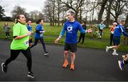 17 February 2024; Karl Henry encourages runners during the Operation Transformation 5K at Phoenix Park in Dublin. Photo by David Fitzgerald/Sportsfile