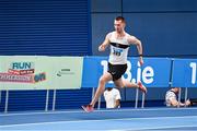 17 February 2024; Jack Raftery of Donore Harriers AC, Dublin, competing in the senior men's 400m during day one of the 123.ie National Senior Indoor Championships at the Sport Ireland National Indoor Arena in Dublin. Photo by Tyler Miller/Sportsfile