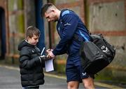 17 February 2024; Ross Byrne of Leinster signs an autograph as he arrives before the United Rugby Championship match between Leinster and Benetton at the RDS Arena in Dublin. Photo by Harry Murphy/Sportsfile