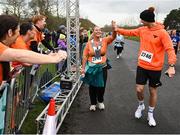 17 February 2024; Holly Gorman and Keith Kelly cross the finish line during the Operation Transformation 5K at Phoenix Park in Dublin. Photo by David Fitzgerald/Sportsfile