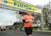 17 February 2024; Chris Farrelly crosses the finish line during the Operation Transformation 5K at Phoenix Park in Dublin. Photo by David Fitzgerald/Sportsfile