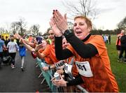17 February 2024; Runners cheer on others after they've finished during the Operation Transformation 5K at Phoenix Park in Dublin. Photo by David Fitzgerald/Sportsfile