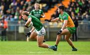 17 February 2024; Ultan Kelm of Fermanagh in action against Brendan McCole of Donegal during the Allianz Football League Division 2 match between Donegal and Fermanagh at O'Donnell Park in Letterkenny, Donegal. Photo by Ramsey Cardy/Sportsfile