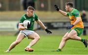 17 February 2024; Ronan McCaffrey of Fermanagh in action against Jamie Brennan of Donegal during the Allianz Football League Division 2 match between Donegal and Fermanagh at O'Donnell Park in Letterkenny, Donegal. Photo by Ramsey Cardy/Sportsfile
