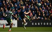 17 February 2024; Jamie Osborne of Leinster kicks under pressure from Onisi Ratave of Benetton during the United Rugby Championship match between Leinster and Benetton at the RDS Arena in Dublin. Photo by Harry Murphy/Sportsfile