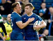 17 February 2024; Luke McGrath of Leinster celebrates with teammate Liam Turner after scoring his side's second try  during the United Rugby Championship match between Leinster and Benetton at the RDS Arena in Dublin. Photo by Harry Murphy/Sportsfile