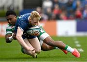 17 February 2024; Jamie Osborne of Leinster is tackled by Onisi Ratave of Benetton during the United Rugby Championship match between Leinster and Benetton at the RDS Arena in Dublin. Photo by Harry Murphy/Sportsfile