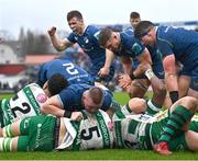 17 February 2024; Jason Jenkins of Leinster, obscured, scores his side's fourth try as teammates celebrate during the United Rugby Championship match between Leinster and Benetton at the RDS Arena in Dublin. Photo by Harry Murphy/Sportsfile