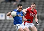 17 February 2024; Gerard Smith of Cavan in action against and Luke Fahy of Cork during the Allianz Football League Division 2 match between Cork and Cavan at SuperValu Páirc Ui Chaoimh in Cork. Photo by Piaras Ó Mídheach/Sportsfile