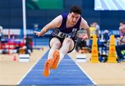 17 February 2024; Eoin Keenan of Emo/Rath AC, Laois, competing in the senior men's triple jump during day one of the 123.ie National Senior Indoor Championships at the Sport Ireland National Indoor Arena in Dublin. Photo by Tyler Miller/Sportsfile