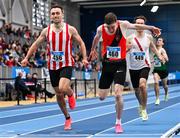 17 February 2024; Dara Donoghue of Lucan Harriers AC, Dublin, right, crosses the finish line ahead of Harry Purcell of Trim AC, Meath, to win the senior men's 800m during day one of the 123.ie National Senior Indoor Championships at the Sport Ireland National Indoor Arena in Dublin. Photo by Tyler Miller/Sportsfile