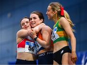 17 February 2024; Athletes, from left, Laura Nally of Galway City Harriers AC, Galway, Alana Ryan of Sli Cualann AC, Wicklow, and Katie Bergin of Moyne AC, Dublin, after competing in the senior women's 200m during day one of the 123.ie National Senior Indoor Championships at the Sport Ireland National Indoor Arena in Dublin. Photo by Tyler Miller/Sportsfile