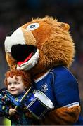 17 February 2024; Leinster supporter Scott O'Neill bangs a drum with Leo the Lion during the United Rugby Championship match between Leinster and Benetton at the RDS Arena in Dublin. Photo by Harry Murphy/Sportsfile