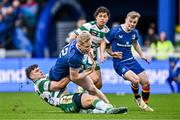 17 February 2024; Jamie Osborne of Leinster is tackled by Leonardo Marin of Benetton during the United Rugby Championship match between Leinster and Benetton at the RDS Arena in Dublin. Photo by Ben McShane/Sportsfile