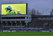 17 February 2024; The Dublin team observe a minutes silence in memory of the late Dublin selector Shane O'Hanlon before the Allianz Football League Division 1 match between Dublin and Roscommon at Croke Park in Dublin. Photo by Stephen Marken/Sportsfile