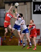 17 February 2024; Gary Mohan of Monaghan and Brendan Rogers of Derry during the Allianz Football League Division 1 match between Derry and Monaghan at Celtic Park in Derry. Photo by Ramsey Cardy/Sportsfile