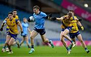 17 February 2024; Seán Bugler of Dublin is tackled by Evan Flynn of Roscommon during the Allianz Football League Division 1 match between Dublin and Roscommon at Croke Park in Dublin. Photo by Stephen Marken/Sportsfile