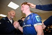 17 February 2024; Henry McErlean of Leinster is congratulated by Leinster forwards and scrum coach Robin McBryde after making his debut in the United Rugby Championship match between Leinster and Benetton at the RDS Arena in Dublin. Photo by Harry Murphy/Sportsfile