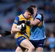 17 February 2024; Niall Higgins of Roscommon is tackled by Lee Gannon of Dublin during the Allianz Football League Division 1 match between Dublin and Roscommon at Croke Park in Dublin. Photo by Ray McManus/Sportsfile