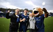 17 February 2024; Henry McErlean of Leinster with his father Kevin, mother Niki and Leo the Lion after making his debut in the United Rugby Championship match between Leinster and Benetton at the RDS Arena in Dublin. Photo by Harry Murphy/Sportsfile
