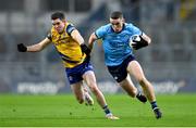 17 February 2024; Brian Fenton of Dublin in action against Ruiadhrí Fallon of Roscommon during the Allianz Football League Division 1 match between Dublin and Roscommon at Croke Park in Dublin. Photo by Stephen Marken/Sportsfile