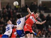 17 February 2024; Brendan Rogers of Derry and Gary Mohan of Monaghan during the Allianz Football League Division 1 match between Derry and Monaghan at Celtic Park in Derry. Photo by Ramsey Cardy/Sportsfile