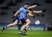 17 February 2024; Ross McGarry of Dublin has his shot blocked by Shane Cunnane of Roscommon during the Allianz Football League Division 1 match between Dublin and Roscommon at Croke Park in Dublin. Photo by Ray McManus/Sportsfile