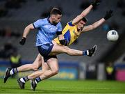 17 February 2024; Shane Cunnane of Roscommon attempts to block this shot by Ross McGarry of Dublin during the Allianz Football League Division 1 match between Dublin and Roscommon at Croke Park in Dublin. Photo by Ray McManus/Sportsfile