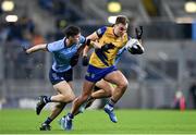 17 February 2024; Enda Smith of Roscommon in action against Theo Clancy of Dublin during the Allianz Football League Division 1 match between Dublin and Roscommon at Croke Park in Dublin. Photo by Stephen Marken/Sportsfile