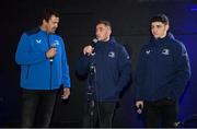 17 February 2024; MC Mike McCarthy, left, interviews Leinster players Jordan Larmour, centre, and Cormac Foley before the United Rugby Championship match between Leinster and Benetton at RDS Arena in Dublin. Photo by Seb Daly/Sportsfile