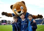 17 February 2024; Matchday mascot Sean Cullinan with Leo the Lion before the United Rugby Championship match between Leinster and Benetton at RDS Arena in Dublin. Photo by Harry Murphy/Sportsfile