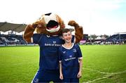 17 February 2024; Matchday mascot Eoin Sheridan with Leo the Lion before the United Rugby Championship match between Leinster and Benetton at RDS Arena in Dublin. Photo by Harry Murphy/Sportsfile