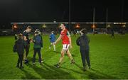 17 February 2024; Diarmuid O'Connor of Mayo leaves the pitch as Gavin White of Kerry signs autographs for fans after the Allianz Football League Division 1 match between Kerry and Mayo at Austin Stack Park in Tralee, Kerry. Photo by Brendan Moran/Sportsfile