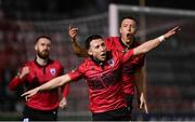 17 February 2024; Chris Lyons of Longford Town celebrates after scoring his side's first goal with team-mates Luke Wade-Slater, left, and Jamie Egan during the SSE Airtricity Men's First Division match between Longford Town and Finn Harps at Bishopsgate in Longford. Photo by Stephen McCarthy/Sportsfile