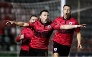 17 February 2024; Chris Lyons of Longford Town celebrates after scoring his side's first goal with team-mates Luke Wade-Slater and Jamie Egan, right, during the SSE Airtricity Men's First Division match between Longford Town and Finn Harps at Bishopsgate in Longford. Photo by Stephen McCarthy/Sportsfile