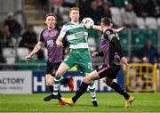 16 February 2024; Rory Gaffney of Shamrock Rovers in action against Jamie Walker, left, and Andy Boyle of Dundalk during the SSE Airtricity Men's Premier Division match between Shamrock Rovers and Dundalk at Tallaght Stadium in Dublin. Photo by Ben McShane/Sportsfile