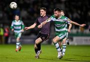 16 February 2024; Jamie Gullan of Dundalk and Josh Honohan of Shamrock Rovers during the SSE Airtricity Men's Premier Division match between Shamrock Rovers and Dundalk at Tallaght Stadium in Dublin. Photo by Ben McShane/Sportsfile