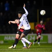 17 February 2024; Noe Baba of Finn Harps in action against Chris Lyons of Longford Town during the SSE Airtricity Men's First Division match between Longford Town and Finn Harps at Bishopsgate in Longford. Photo by Stephen McCarthy/Sportsfile