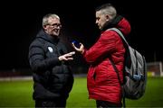 17 February 2024; Journalist Kieran Burke interviews Finn Harps manager Darren Murphy after the SSE Airtricity Men's First Division match between Longford Town and Finn Harps at Bishopsgate in Longford. Photo by Stephen McCarthy/Sportsfile