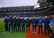 17 February 2024; Dublin officials, left to right, Sean Murphy, backroom, Brian O’Regan, selector, Mick Galvin, selector, Ger Lyons, selector, Darren Daly, selector, Dessie Farrell, Dublin manager, Séamus McCormack, Media Manager, Dr Diarmuid Smyth, James Allen, Chartered Physiotherapist during a minutes silence in memory of the late Dublin selector Shane O'Hanlon before the Allianz Football League Division 1 match between Dublin and Roscommon at Croke Park in Dublin. Photo by Ray McManus/Sportsfile