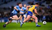 17 February 2024;  Enda Smith  of Roscommon is tackled by John Small of Dublin during the Allianz Football League Division 1 match between Dublin and Roscommon at Croke Park in Dublin. Photo by Ray McManus/Sportsfile