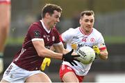 18 February 2024; John Daly of Galway in action against Darragh Canavan of Tyrone during the Allianz Football League Division 1 match between Tyrone and Galway at O'Neills Healy Park in Omagh, Tyrone. Photo by Ramsey Cardy/Sportsfile