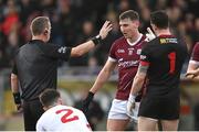 18 February 2024; Referee Joe McQuillan speaks to Matthew Tierney of Galway following a foul during the Allianz Football League Division 1 match between Tyrone and Galway at O'Neills Healy Park in Omagh, Tyrone. Photo by Ramsey Cardy/Sportsfile