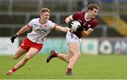 18 February 2024; John Daly of Galway in action against Lorcan McGarrity of Tyrone during the Allianz Football League Division 1 match between Tyrone and Galway at O'Neills Healy Park in Omagh, Tyrone. Photo by Ramsey Cardy/Sportsfile