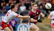 18 February 2024; Johnny McGrath of Galway in action against Niall Devlin of Tyrone during the Allianz Football League Division 1 match between Tyrone and Galway at O'Neills Healy Park in Omagh, Tyrone. Photo by Ramsey Cardy/Sportsfile