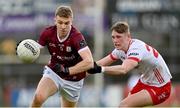 18 February 2024; Dylan McHugh of Galway in action against Lorcan McGarrity of Tyrone during the Allianz Football League Division 1 match between Tyrone and Galway at O'Neills Healy Park in Omagh, Tyrone. Photo by Ramsey Cardy/Sportsfile