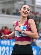 18 February 2024; Claire Fagan of Mullingar Harriers AC, Westmeath celebrates after finishing first in the senior women's 3000m final during day two of the 123.ie National Senior Indoor Championships at the Sport Ireland National Indoor Arena in Dublin. Photo by Tyler Miller/Sportsfile
